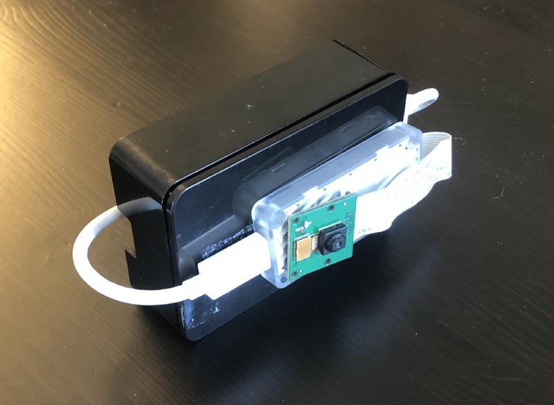 The Raspberry Pi Setup with Coral accelerator and camera attached